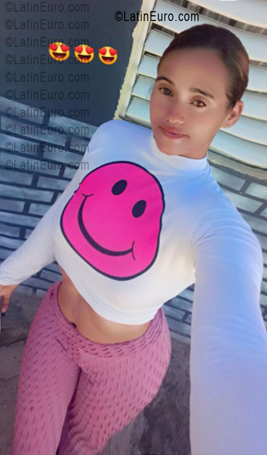 Date this fun Dominican Republic girl Santa from Gaspar Hernandez DO55701